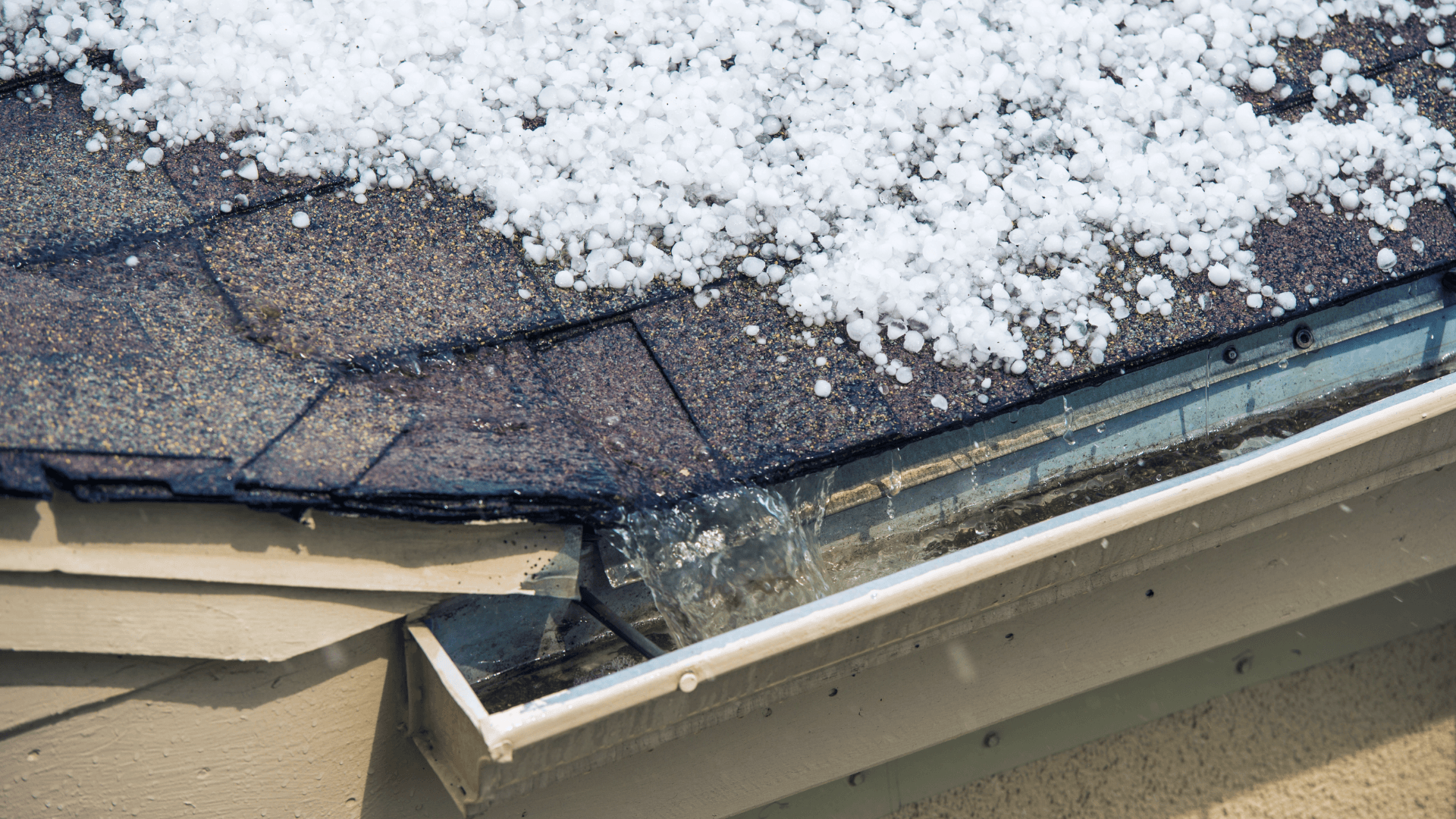 Hail on roof causing damage.